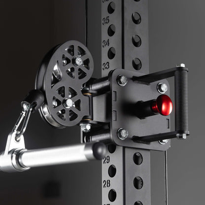 Close-up of heavy-duty steel pulley and adjustable handle for lat pulldown on a commercial functional trainer.