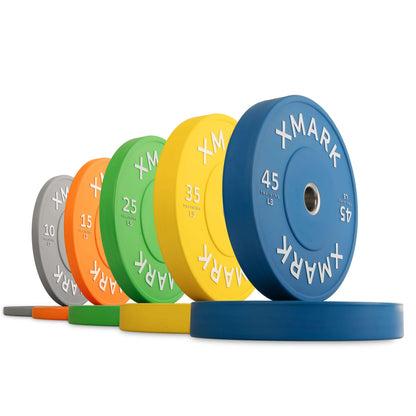 Commercial color bumper plates in various weights, designed for durability and high performance workouts.