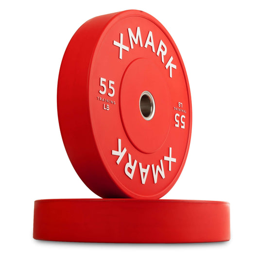 XMARK 55 lb training bumper plates in red color, designed for accuracy, durability, and versatility in workouts.