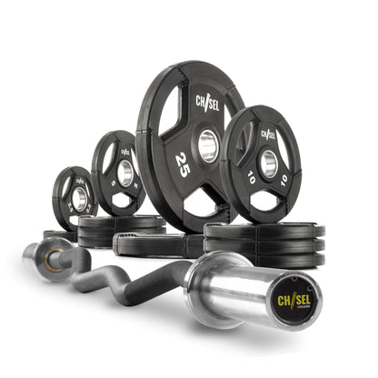 Chisel Olympic weight plates and curl barbell set on a white background, featuring various plate weights and a curl bar.