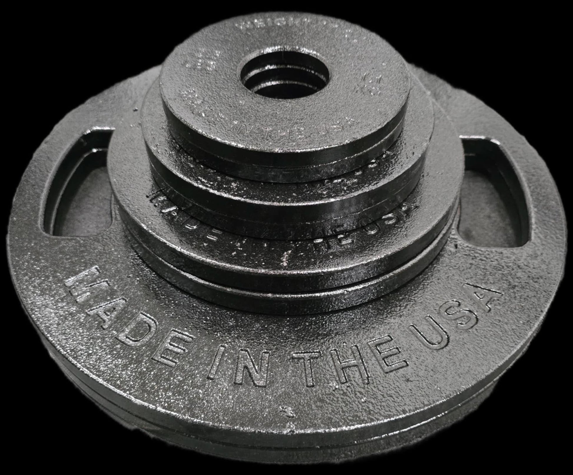 Cast Iron Machined Weight Plate Sets - top view with different weights stacked (clear finish)