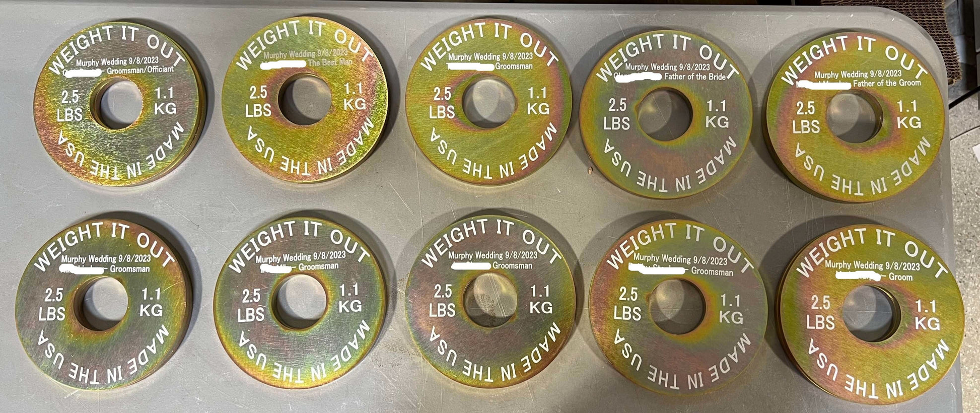 Custom Engraved Solid Steel Calibrated Weight Plate Pairs - top view of plate set layout