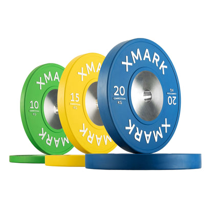 Premium competition bumper plates in green, yellow, and blue, showing weight markings for easy identification.