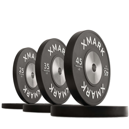 Black premium IWF training bumper plates in various weights, designed for durability and precision in workouts.