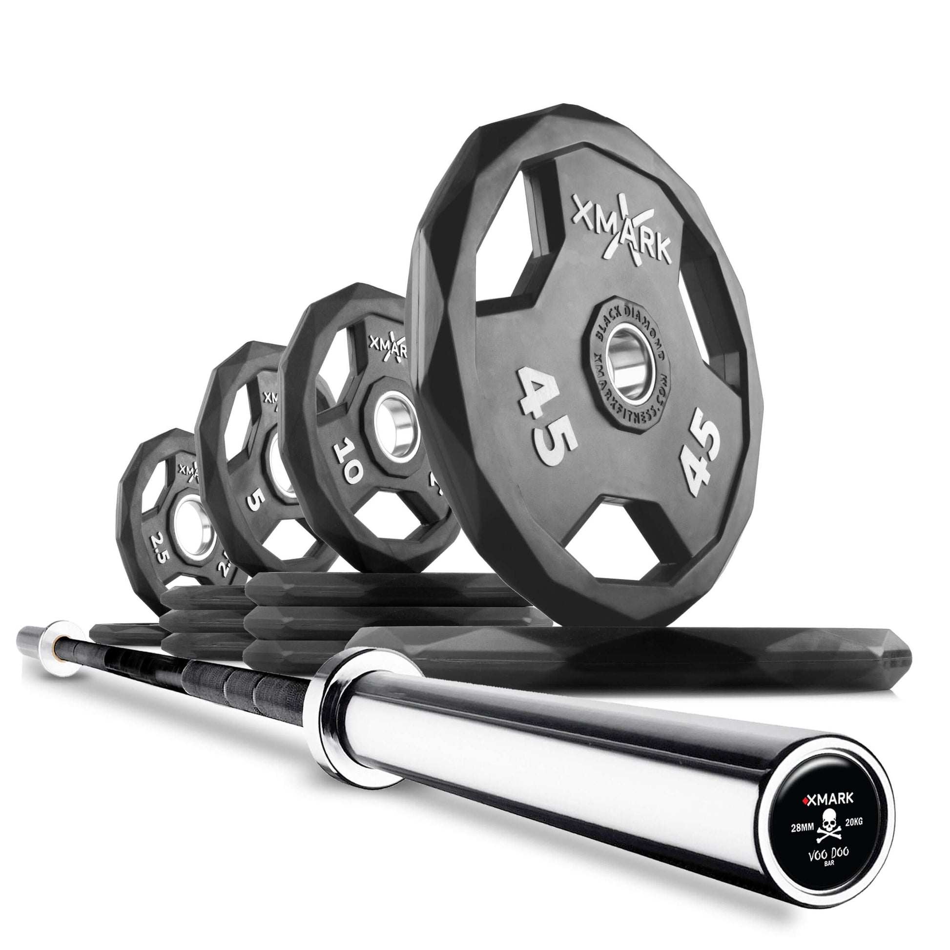 Black Olympic weight plates in various sizes stacked alongside a shiny Olympic barbell for home gym setup.