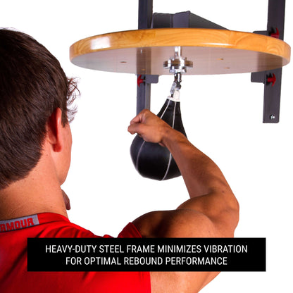 Person training with a professional speed bag platform showcasing its heavy-duty steel frame and optimal rebound performance.