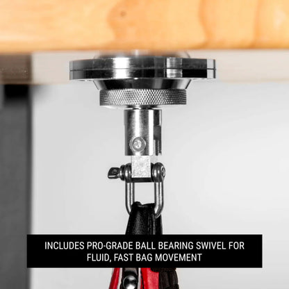 Close-up of pro-grade ball bearing swivel for smooth, fluid bag movement on a wall-mounted speed bag platform.