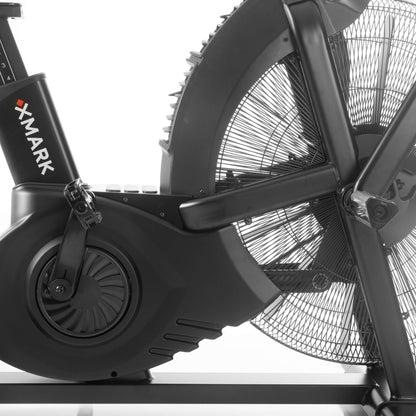 Close-up of the CAT 5 Hurricane Commercial Air Bike's fan and resistance mechanism, emphasizing its robust design.