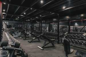Completed gym filled with machines and free weights